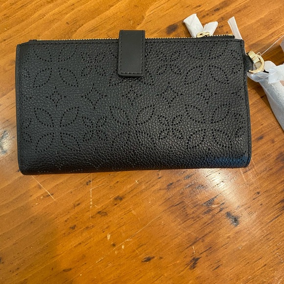 Michael Kors wristlet, black, NWT. Flowers, leather, cutout, quiet luxury - Picture 2 of 5